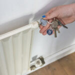 RCS recycled zinc alloy radiator key keychain with coin - Image 2
